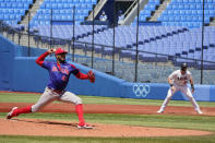 Dominican Republic's Denyi Reyes (41) pitches against the United States in a baseball game at the 2020 Summer Olympics, Wednesday, Aug. 4, 2021, in Yokohama, Japan. (AP Photo/Sue Ogrocki)