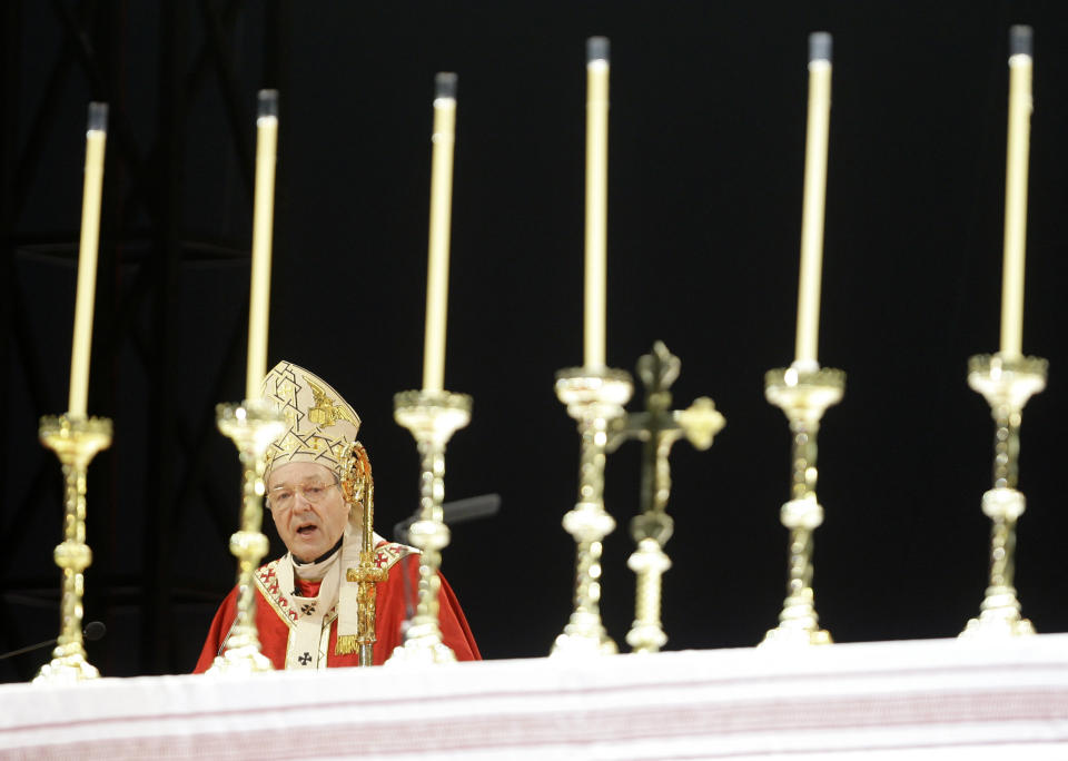 FILE - In this July 15, 2008, file photo, Cardinal George Pell speaks during the opening mass for World Youth Day in Sydney. Pell was sentenced in an Australian court on Wednesday, March 13, 2019 to 6 years in prison for molesting two choirboys in a Melbourne cathedral more than 20 years ago. (AP Photo/Rick Rycroft, File)