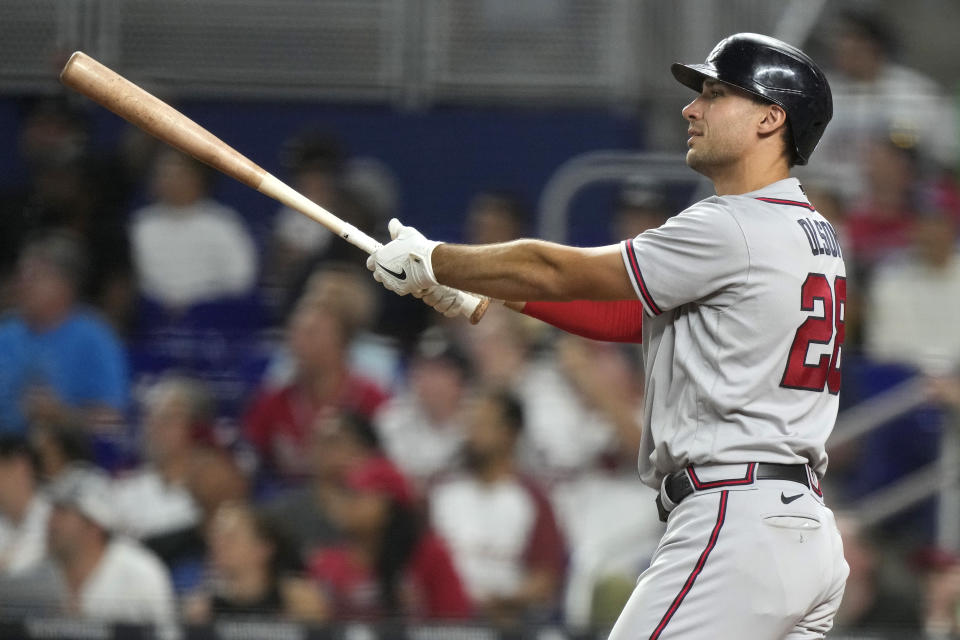 Atlanta Braves' Matt Olson watches after hitting a solo home run during the sixth inning of a baseball game against the Miami Marlins, Saturday, Sept. 16, 2023, in Miami. (AP Photo/Lynne Sladky)