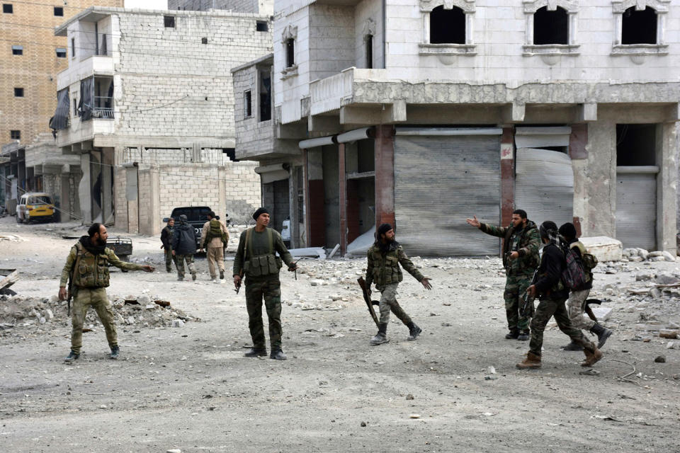 Syria regime troops celebrate Aleppo victory; executions reported