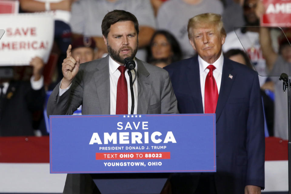 JD Vance, Republican candidate for U.S. Senator for Ohio, is accompanied by Former President Donald Trump as he speaks at a campaign rally in Youngstown, Ohio., Saturday, Sept. 17, 2022. (AP Photo/Tom E. Puskar)