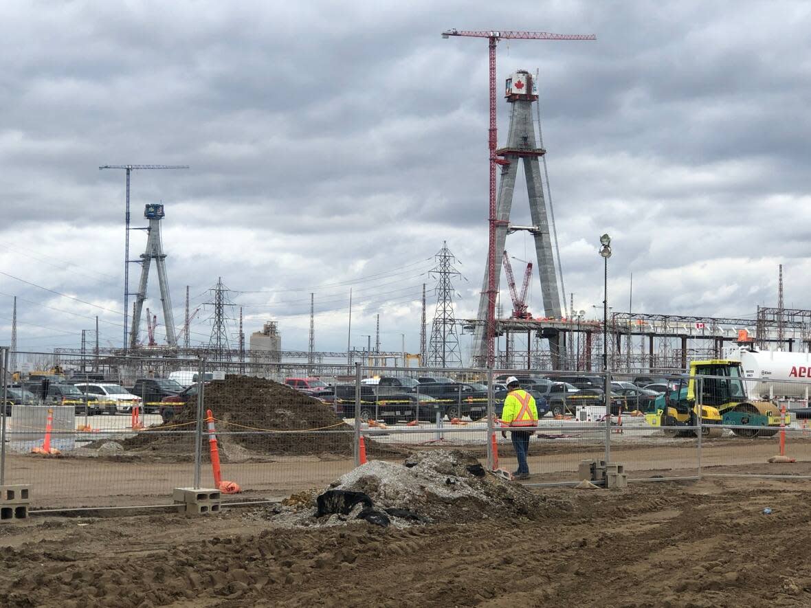 Construction on the Gordie Howe International Bridge has brought jobs to Windsor, and its completion will strengthen cross-border travel, another economic benefit, according to the Conference Board of Canada. (Dale Molnar/CBC News - image credit)