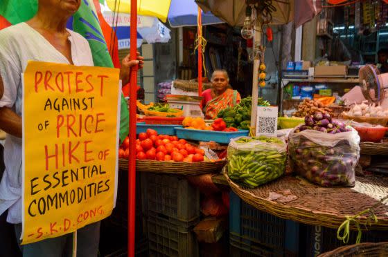 Supporters of Indian national congress are seen in a demonstration at a vegetable market against inflated prices of fruits and vegetables, as seen in Kolkata, India, on July 3, 2023. <span class="copyright">Debarchan Chatterjee—NurPhoto via Getty Images</span>
