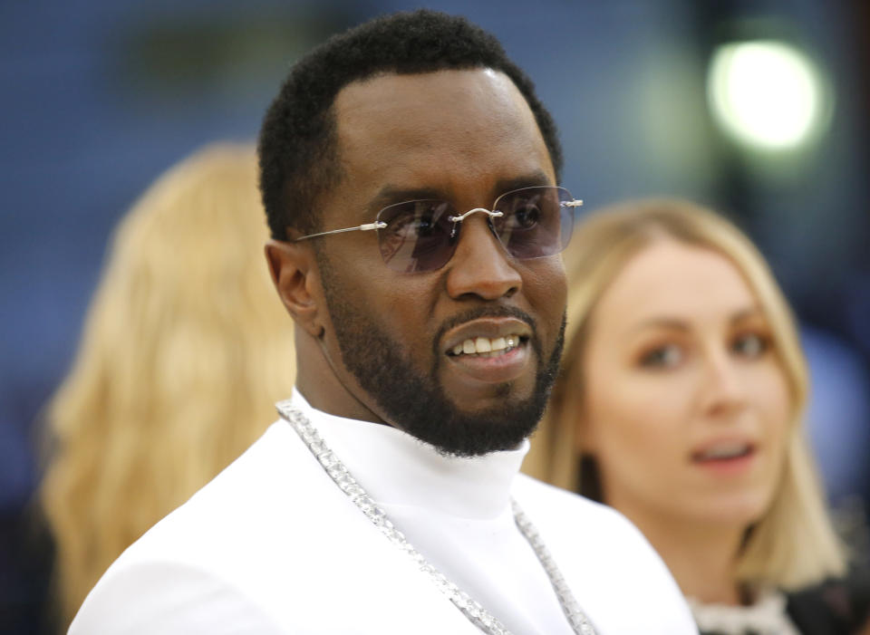 Sean Combs arrives at the Metropolitan Museum of Art Costume Institute Gala (Met Gala) to celebrate the opening of “Heavenly Bodies: Fashion and the Catholic Imagination” in the Manhattan borough of New York, U.S., May 7, 2018. REUTERS/Eduardo Munoz