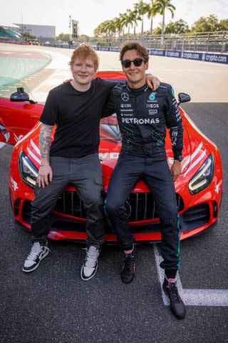 <p>Motorsport Images / SplashNews.com</p> Ed Sheeran and George Russell at the Formula One Miami Grand Prix in Miami on May 3, 2024