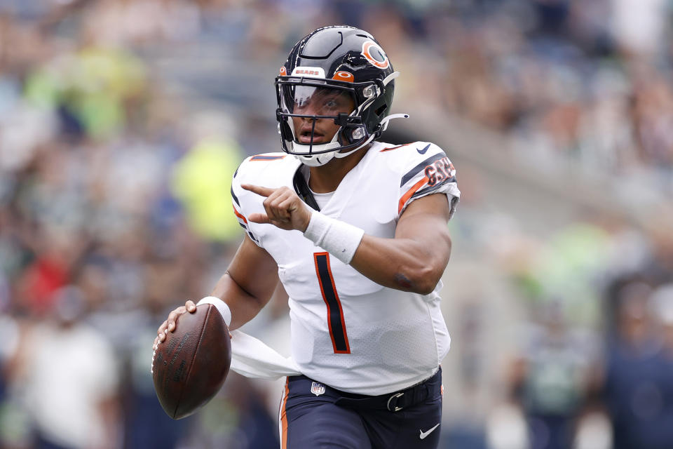 SEATTLE, WASHINGTON - AUGUST 18: Justin Fields #1 of the Chicago Bears looks to pass \in the first half during the preseason game between the Seattle Seahawks and the Chicago Bears at Lumen Field on August 18, 2022 in Seattle, Washington.  (Photo by Steph Chambers/Getty Images)