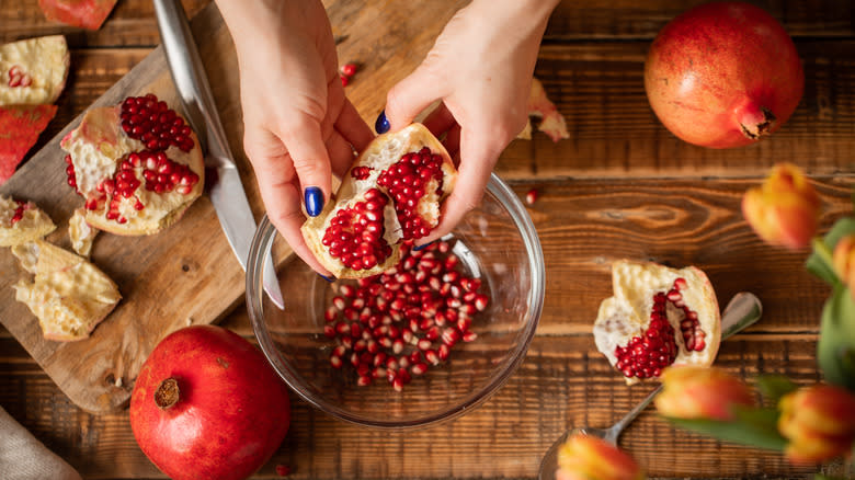 removing pomegranate seeds from fruit