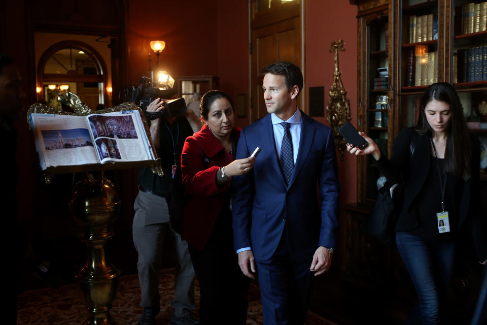 Congressman Aaron Schock speaks to the media as he arrives at an immigration reform panel hosted by the Illinois Business Immigration Coalition Monday, March 9, 2015, at St. Ignatius College Prep in Chicago. Schock resigned Tuesday amid controversy over his spending habits. (Nancy Stone/Chicago Tribune/Tribune News Service via Getty Images)