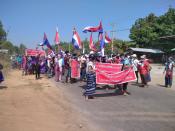 Protesters hold placards during the ant-coup protest in Hpapun Township