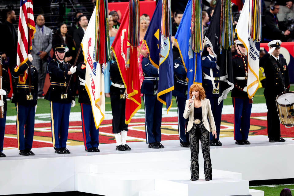 Reba McEntire performs the national anthem ahead of Super Bowl LVIII at Allegiant Stadium on February 11, 2024 in Las Vegas. / Credit: Christopher Polk/Billboard via Getty Images