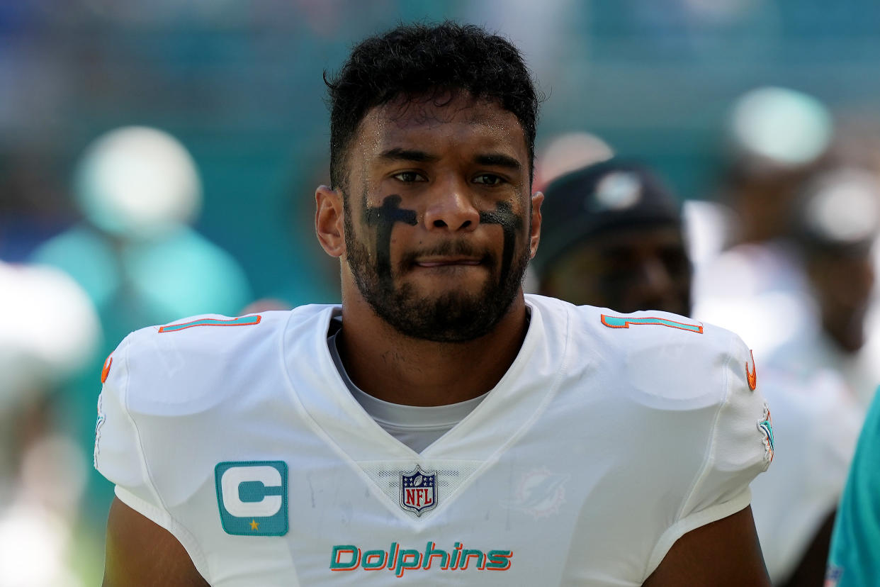 Miami Dolphins quarterback Tua Tagovailoa is in the concussion protocol this week, meaning his status for a matchup against the New England Patriots this week is in doubt. (Photo by Eric Espada/Getty Images)