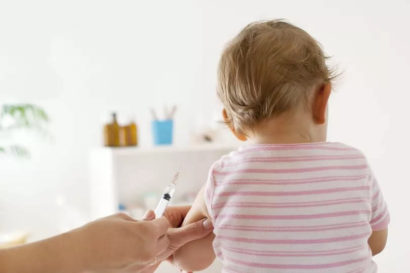 A baby getting a vaccination