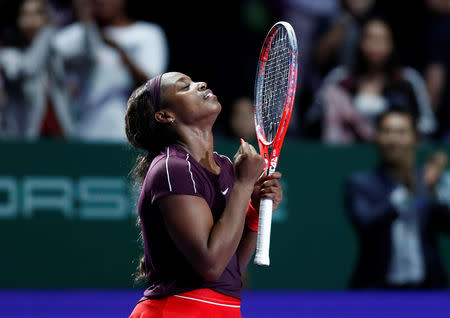 Tennis - WTA Tour Finals - Singapore Indoor Stadium, Kallang, Singapore - October 27, 2018 Sloane Stephens of the U.S. celebrates winning her semi final match against Czech Republic's Karolina Pliskova REUTERS/Edgar Su