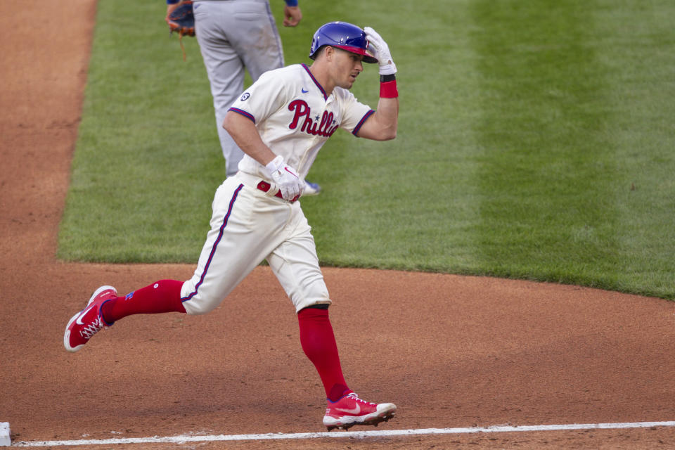 Philadelphia Phillies J.T. Realmuto (10) runs the bases after hitting a three run homer during the fifth inning of a baseball game against the New York Mets, Wednesday, April 7, 2021, in Philadelphia. (AP Photo/Laurence Kesterson)