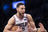 FILE - Philadelphia 76ers guard Ben Simmons reacts after grabbing a rebound during the second half of an NBA basketball game against the Brooklyn Nets in New York, in this Monday, Jan. 20, 2020, file photo. Simmons says he's taking his ball and going home. The 76ers say they still want their disgruntled All-Star guard. (AP Photo/Mary Altaffer, File)