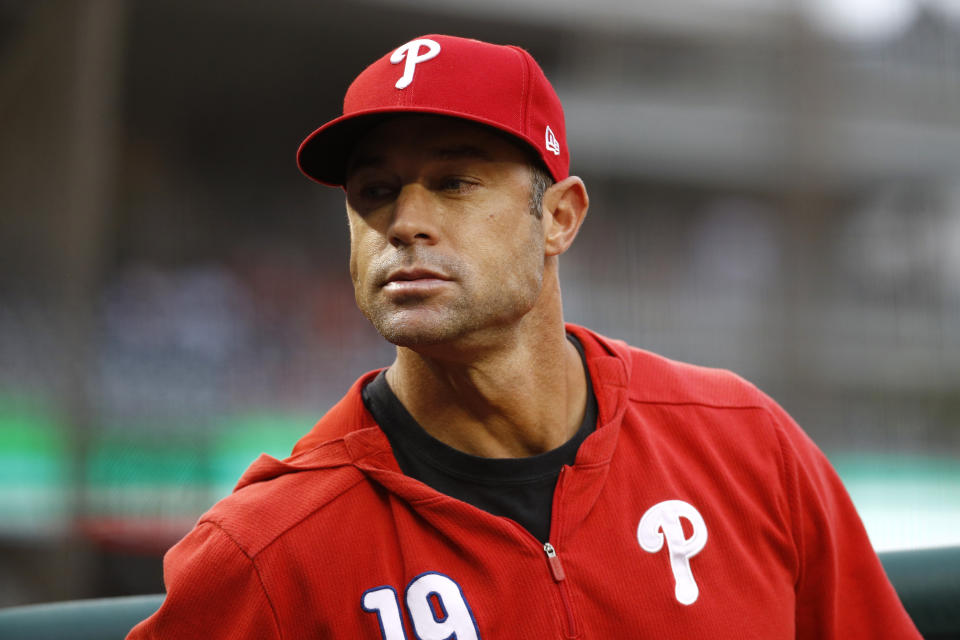 Philadelphia Phillies manager Gabe Kapler stands in the dugout during a baseball game against the Washington Nationals, Thursday, Sept. 26, 2019, in Washington. (AP Photo/Patrick Semansky)