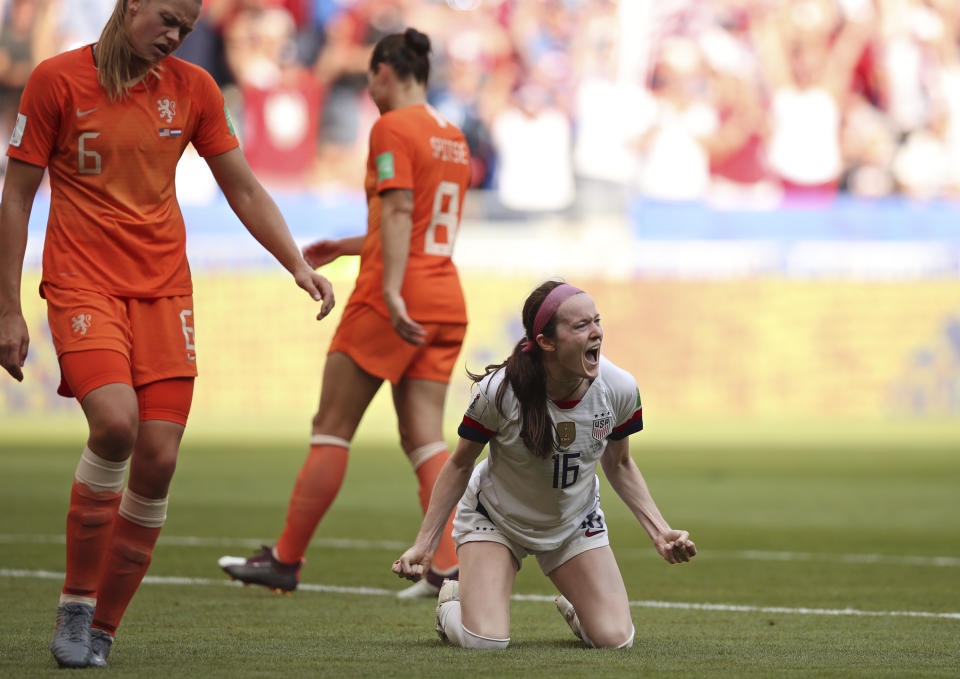 United States' Rose Lavelle, right, celebrates after scoring her side's second goal during the Women's World Cup final soccer match between US and The Netherlands at the Stade de Lyon in Decines, outside Lyon, France, Sunday, July 7, 2019. (AP Photo/Francisco Seco)