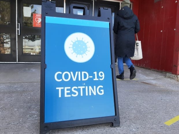 A person enters the Halifax Forum Multi-Purpose Centre on Saturday, Feb. 27, 2021, for a COVID-19 test.