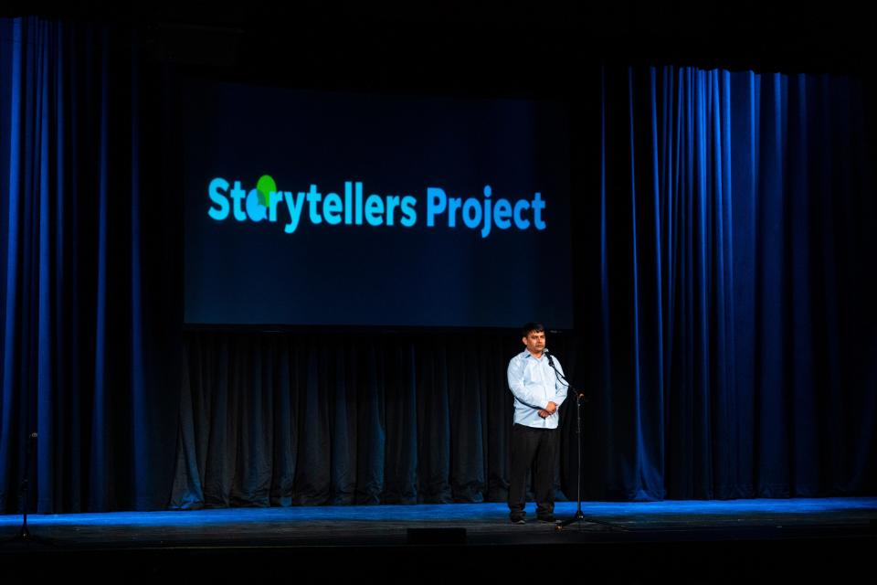 Shir Agha Safi tells a story during the Des Moines Storytellers Project's "Travel" show at Hoyt Sherman Place on Tuesday, June 20, 2023, in Des Moines.