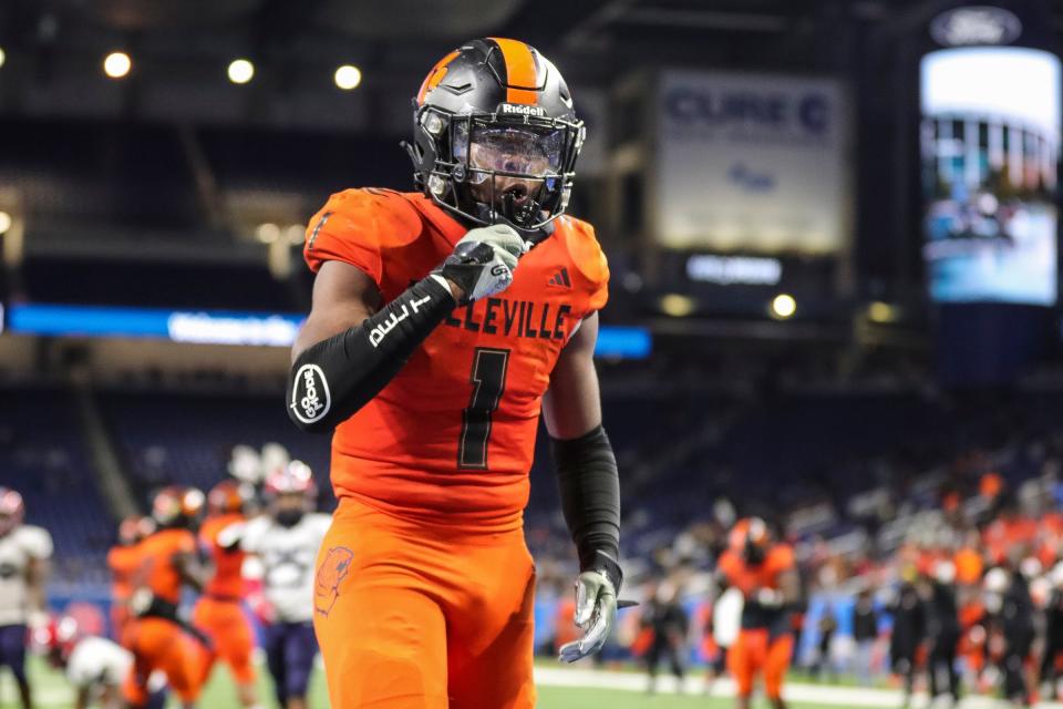 Belleville running back Jeremiah Beasley celebrates a touchdown against Southfield A&T during the second half of the Division 1 state final at Ford Field in Detroit on Sunday, Nov. 26, 2023.