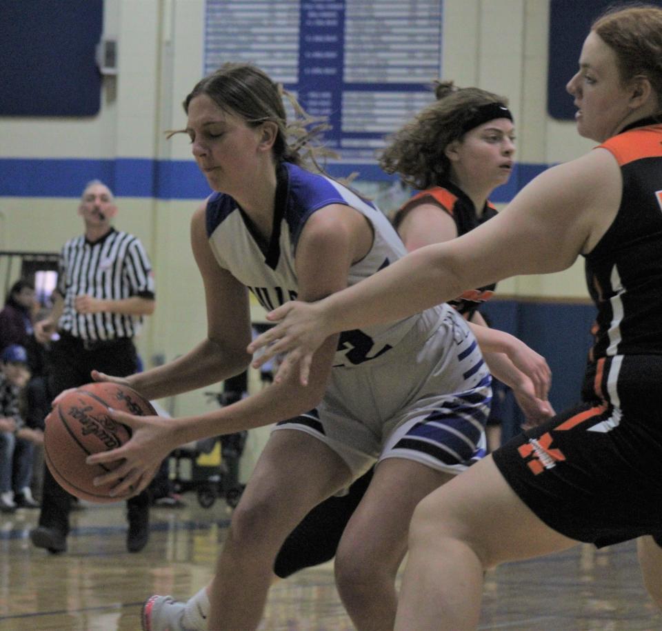 Inland Lakes' Taylor Jones (22) tries to get past a Mancelona defender during the first half on Wednesday night.