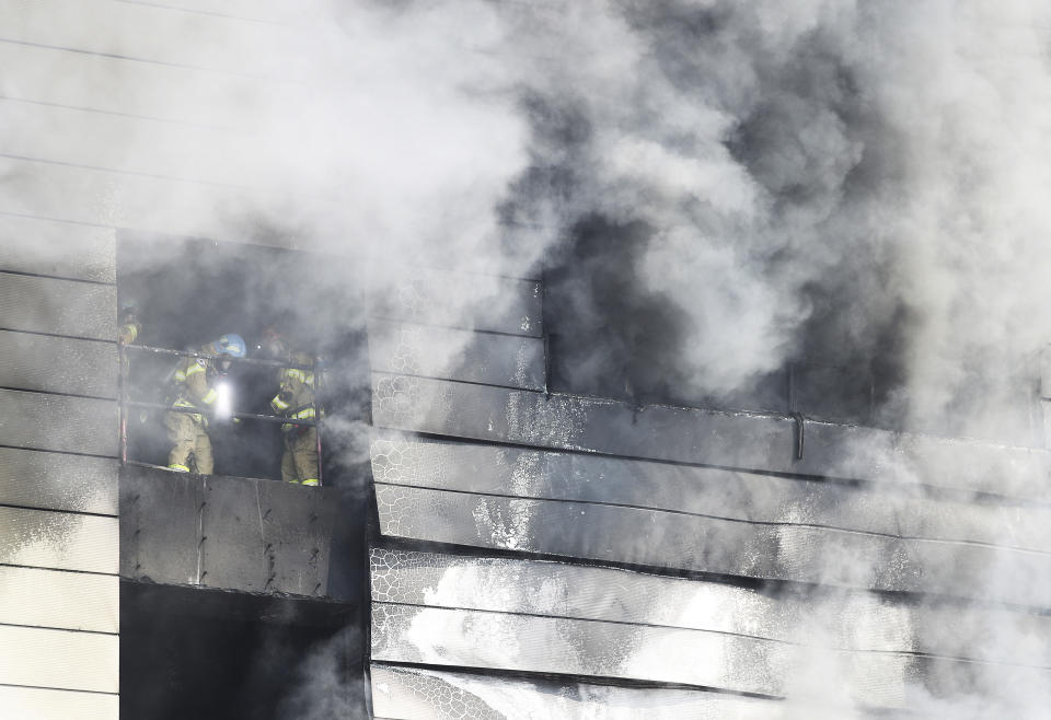 Firefighters battle a fire at a construction site in Icheon, South Korea, Wednesday, April 29, 2020. Several workers were killed in the fire, South Korean officials said. (Hong Ki-won/Yonhap via AP)