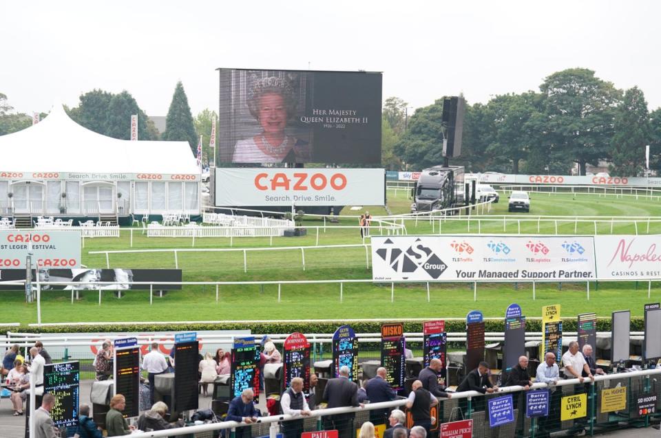 There was also a tribute to the Queen on the big screen at Doncaster Racecourse (Tim Goode/PA) (PA Wire)