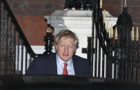 Britain's Prime Minister and Conservative Party leader Boris Johnson leaves Conservative Party headquarters in London, Friday, Dec. 13, 2019. Prime Minister Boris Johnson's Conservative Party appeared on course Friday to win a solid majority of seats in Britain's Parliament— a decisive outcome to a Brexit-dominated election that should allow Johnson to fulfill his plan to take the U.K. out of the European Union next month. (AP Photo/Thanassis Stavrakis)