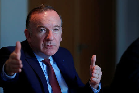 French employers body MEDEF union leader Pierre Gattaz gestures as he attends an interview with Reuters in Paris, France, March 30, 2017. REUTERS/Gonzalo Fuentes