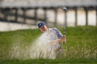 Ernie Els, of South Africa, hits out of the bunker on the 17th hole during a practice round for the U.S. Open Championship golf tournament Tuesday, June 11, 2019, in Pebble Beach, Calif. (AP Photo/David J. Phillip)