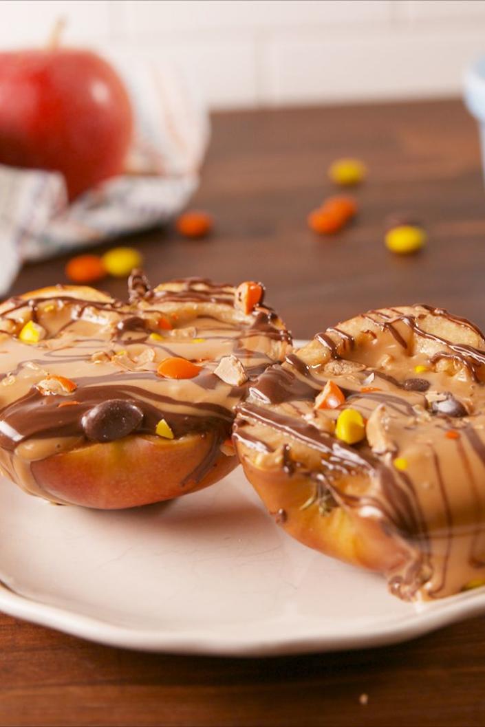 <p>Extreme peanut butter ahead.</p><p>Get the recipe from <a href="https://www.delish.com/cooking/recipe-ideas/recipes/a57739/peanut-butter-stuffed-apples-recipe/" rel="nofollow noopener" target="_blank" data-ylk="slk:Delish;elm:context_link;itc:0" class="link ">Delish</a>. </p>