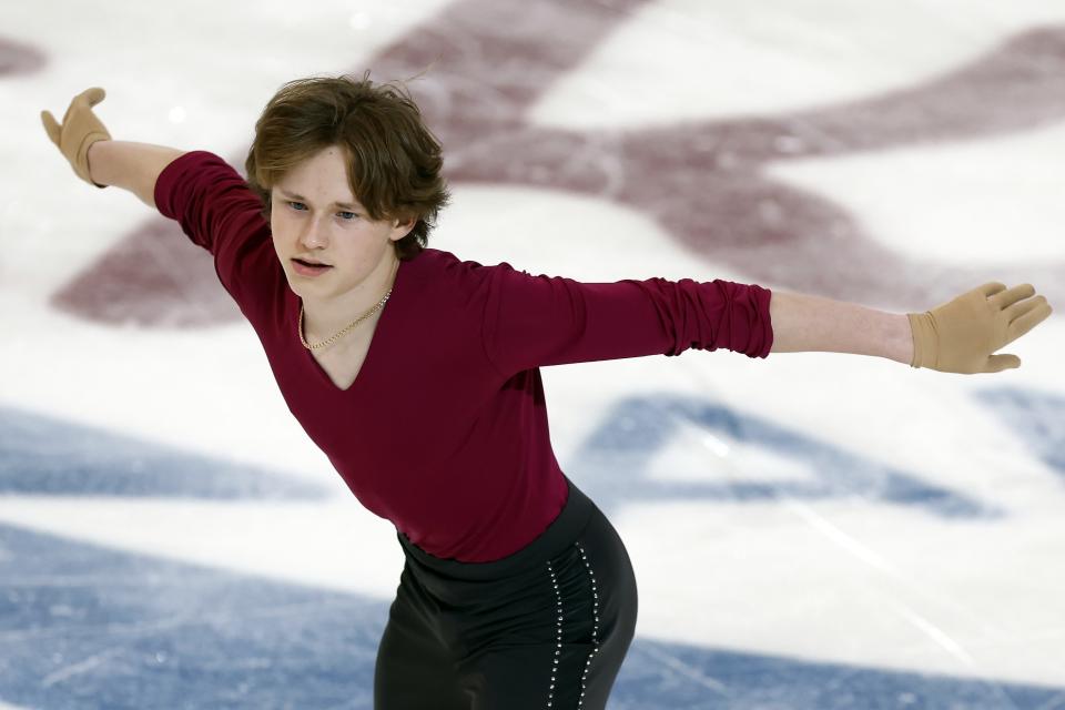 Ilia Malinin performs in the men's short program during the Grand Prix Skate America Series figure skating event Friday, Oct. 21, 2022, in Norwood, Mass. (AP Photo/Michael Dwyer)