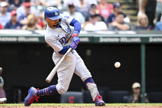 Betts hits two of Dodgers' five homers and drives in four runs in 11-4