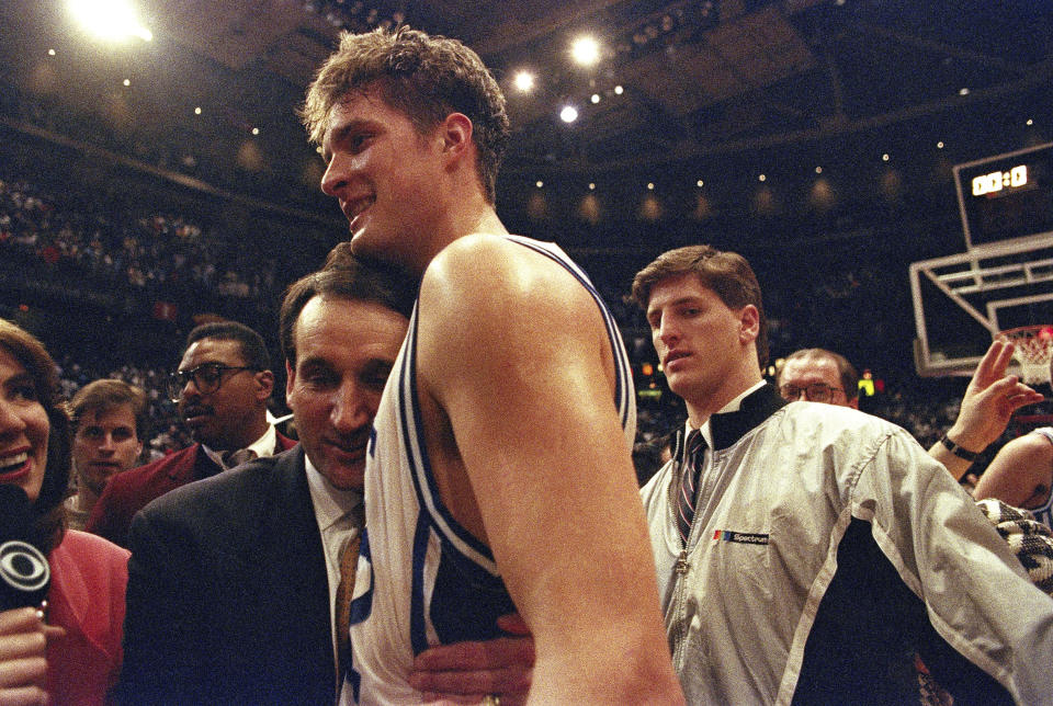 Duke coach Mike Krzyzewski hugs Christian Laettner after his historic shot to beat Kentucky in 1992. (AP Photo/Amy Sancetta, File)