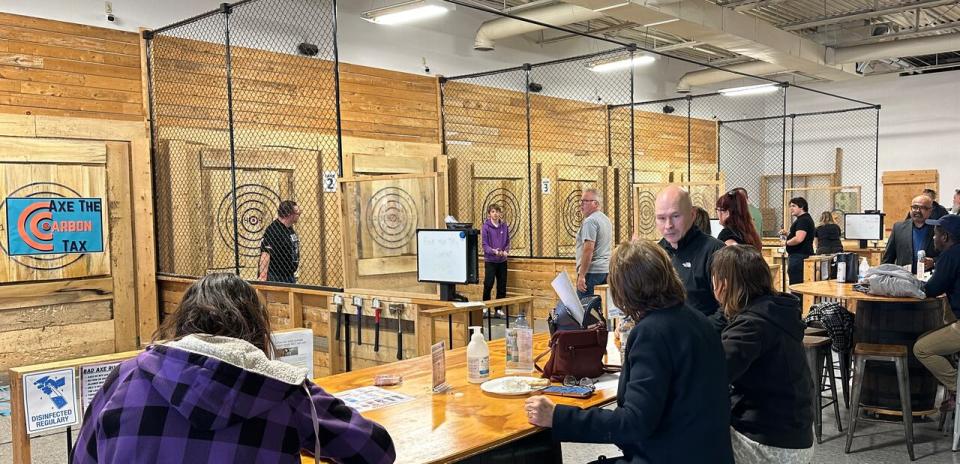 Inside the venue Bad Axe Throwing on Dougall Avenue in Windsor during a Conservative Party rally against the federal carbon tax.