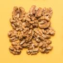 <p>There's never been a better time to go nuts for nuts. "Many <a href="https://www.ncbi.nlm.nih.gov/pmc/articles/PMC3257681/" rel="nofollow noopener" target="_blank" data-ylk="slk:studies;elm:context_link;itc:0;sec:content-canvas" class="link ">studies</a> show us that regularly eating nuts can help lower our cholesterol — both total cholesterol and 'bad' LDL cholesterol," Gorin says. "Some research indicates that taking in 60 grams — about 2.1 ounces — of nuts daily yields the biggest benefits."</p>