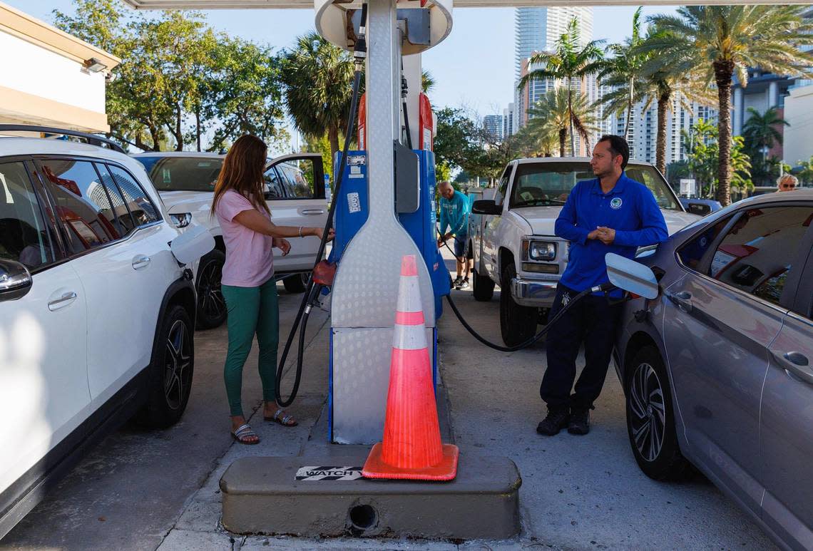 Drivers put fuel in vehicles at the Mobil gas station located at 18300 Collins Avenue in Sunny Isles Beach, Florida on Tuesday, April 18, 2023.
