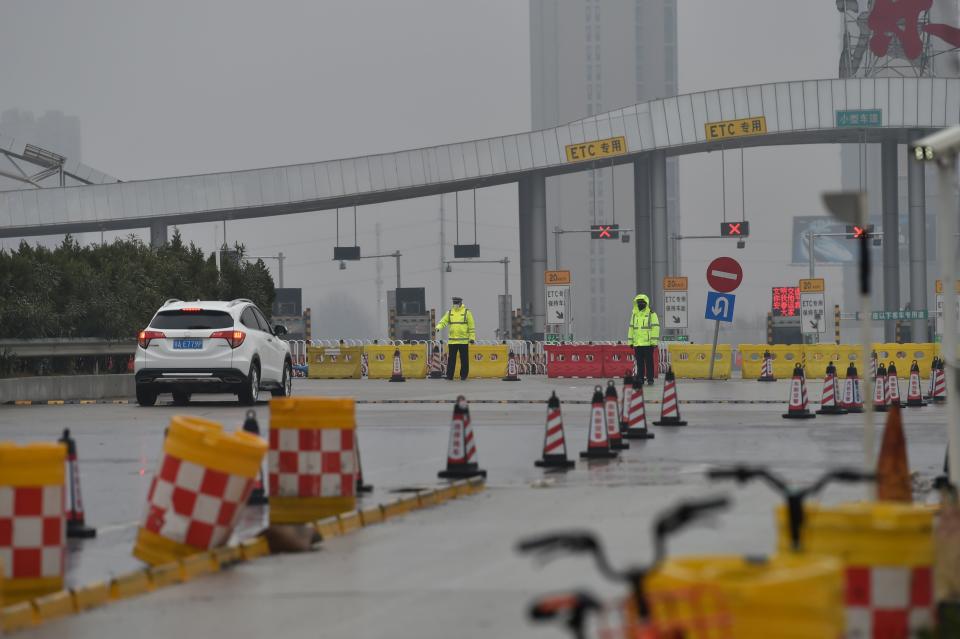 A general view shows one of the roads blocked by the police to restrict people leaving Wuhan in China's central Hubei.