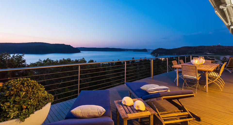 The sizeable balcony allows you to watch the sunset over the water. Source: Domain