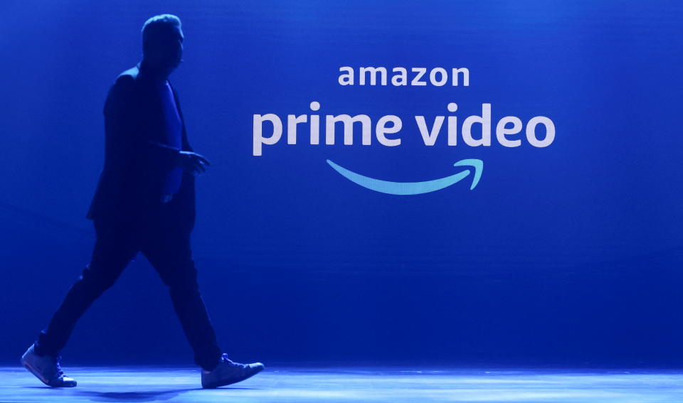 A man walks past an Amazon Prime Video logo during a launch event in Mumbai, India, April 28, 2022. REUTERS/Francis Mascarenhas