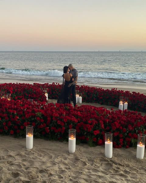 <p>10 months after confirming they were dating in January 2021, Kourtney and Travis announced <a href="https://www.cosmopolitan.com/uk/entertainment/a37985052/kourtney-kardashian-travis-barker-engaged/" rel="nofollow noopener" target="_blank" data-ylk="slk:they were engaged" class="link rapid-noclick-resp">they were engaged </a>with a series of loved up snaps from the proposal. "Forever," Kourtney captioned the photo from 18 October, which showed the pair surrounded by red roses. Wow.</p><p><a href="https://www.instagram.com/p/CVJzKB2FGUq/" rel="nofollow noopener" target="_blank" data-ylk="slk:See the original post on Instagram" class="link rapid-noclick-resp">See the original post on Instagram</a></p>