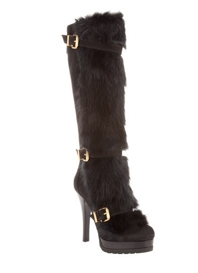 Fendi, $3,228. Furry shins with shiny buckles.