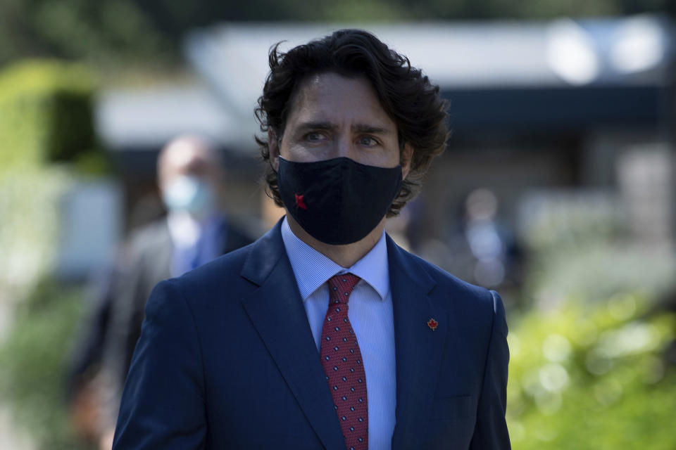 Canada's Prime Minister Justin Trudeau arrives for a working session at the G7 summit in Cornwall, England, Saturday June 12, 2021. (Brendan Smialowski/Pool via AP)