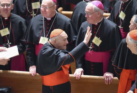 Cardinal Archbishop Emeritus Theodore McCarrick waves to fellow bishops as he attends the midday prayer service at the Cathedral of St. Matthews in Washington September 23, 2015. REUTERS/Jonathan Newton/Pool