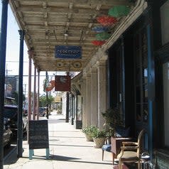 a row of shops along magazine street