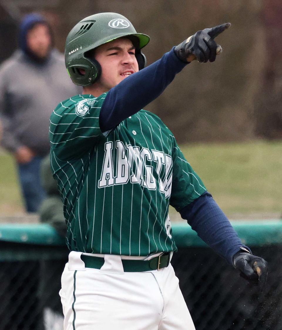 Abington's Spencer Merrick scored a run during a game versus East Bridgewater on Wednesday, April 5, 2023.