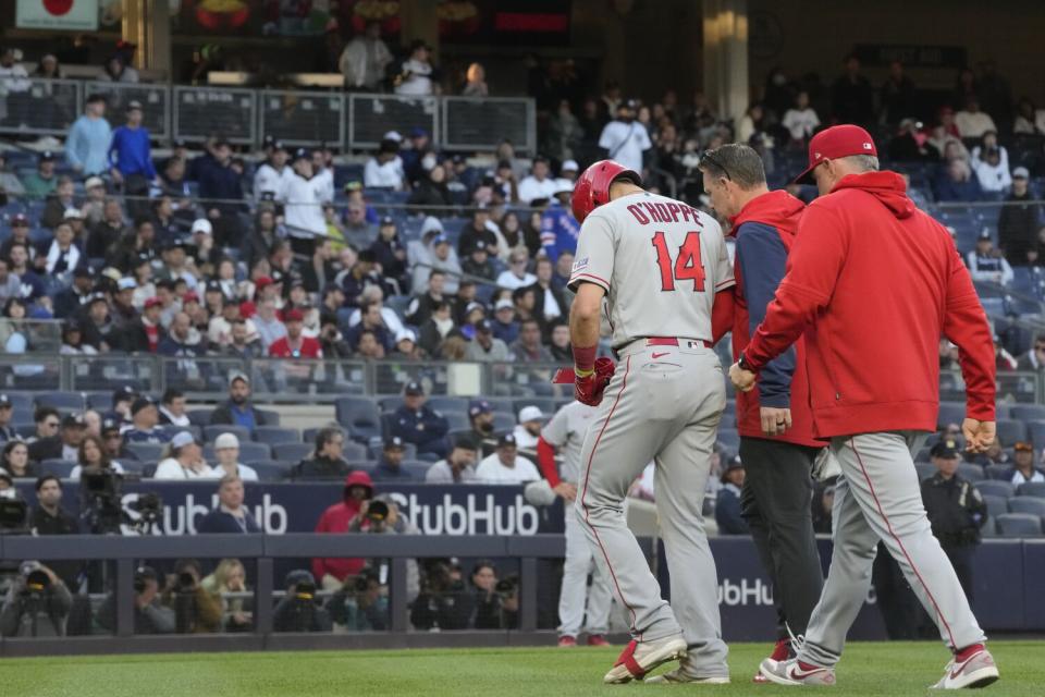 The Angels' Logan O'Hoppe walks off the field after being injured during the ninth inning against the Yankees on April 20.
