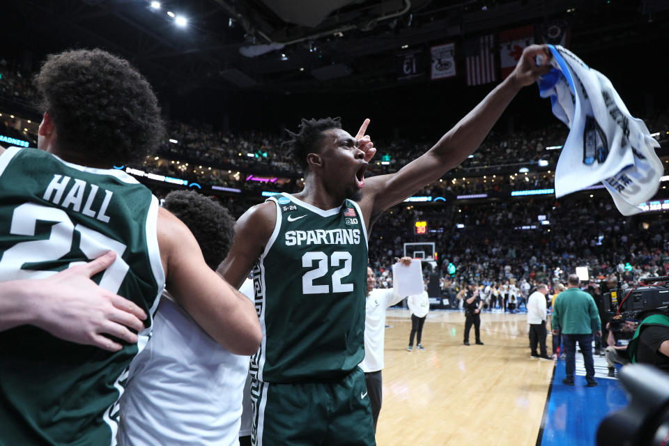COLUMBUS, OHIO - MARCH 19: Mady Sissoko #22 of the Michigan State Spartans celebrates after defeating the Marquette Golden Eagles in the second round game of the NCAA Men's Basketball Tournament at Nationwide Arena on March 19, 2023 in Columbus, Ohio. (Photo by Andy Lyons/Getty Images)