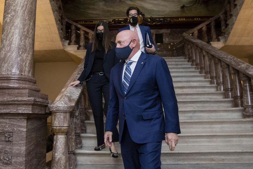 Sen. Mark Kelly, D-Ariz., arrives to deliver his maiden speech to the Senate, at the Capitol in Washington, Wednesday, Aug. 4, 2021. (AP Photo/Amanda Andrade-Rhoades)