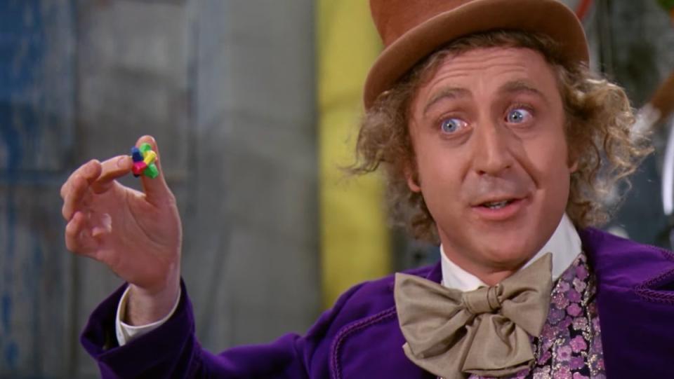 Willy Wonka holding an Everlasting Gobstopper